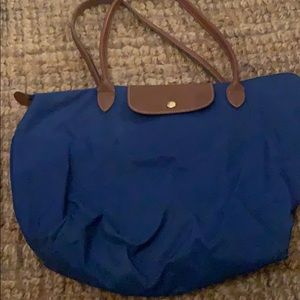 Well loved royal blue long champ tote bag